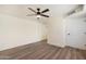 This bright bedroom has a ceiling fan and neutral paint for a modern aesthetic at 3021 N Randolph Rd, Phoenix, AZ 85014