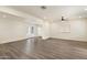 A spacious living room with recessed lighting, a ceiling fan, and neutral paint at 3021 N Randolph Rd, Phoenix, AZ 85014