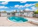 Backyard pool for leisure with diving board, ideal for summertime enjoyment and exercise at 3021 N Randolph Rd, Phoenix, AZ 85014
