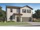Charming two-story home featuring a tile roof, neutral stucco exterior, and attached two-car garage at 32611 N Jasper St, San Tan Valley, AZ 85143