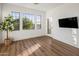 Bright bonus room with hard floors and tree views at 3737 E Donald Dr, Phoenix, AZ 85050
