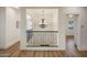 Upstairs foyer with decorative railing and chandelier at 3737 E Donald Dr, Phoenix, AZ 85050