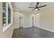 Bright bedroom features tile flooring, a window, and two closets with white doors and white trim at 4055 E Catalina Cir, Mesa, AZ 85206