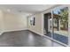 Versatile bonus room featuring modern tile flooring, recessed lighting, and sliding glass doors at 4055 E Catalina Cir, Mesa, AZ 85206