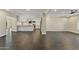 Modern open-concept kitchen and living area with tile floors and recessed lighting at 4055 E Catalina Cir, Mesa, AZ 85206