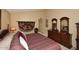 Well appointed bedroom featuring wood furnishings, mirrors, and unique decor at 416 Leisure World --, Mesa, AZ 85206