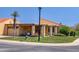 Inviting single-story home with a covered patio, colorful landscaping, and attached garage at 416 Leisure World --, Mesa, AZ 85206