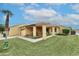 Inviting single-story home with covered patio and well-manicured lawn in a desirable neighborhood at 416 Leisure World --, Mesa, AZ 85206