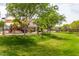 Lush green community park featuring playgrounds, picnic shelters, and scenic walking paths at 4289 E Jasper Dr, Gilbert, AZ 85296