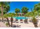 Enjoy the sun near the inviting community pool with ample seating and a shaded pavilion, perfect for relaxation at 4289 E Jasper Dr, Gilbert, AZ 85296