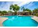 Bright and inviting community pool area with a spacious pool, shaded pavilion, and well-maintained landscaping at 4289 E Jasper Dr, Gilbert, AZ 85296