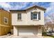 Charming home featuring a two-car garage with a stucco exterior under a blue sky at 4289 E Jasper Dr, Gilbert, AZ 85296