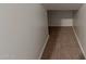 Hallway with neutral walls and carpeting going downstairs at 4289 E Jasper Dr, Gilbert, AZ 85296