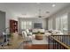 Open-concept living room with a comfortable seating arrangement, modern furnishings, and plenty of natural light at 4289 E Jasper Dr, Gilbert, AZ 85296