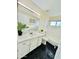 Bathroom featuring a sink, mirror, toilet, and shower/tub combo with hexagon black tile at 4349 E Encinas Ave, Gilbert, AZ 85234