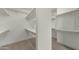 Large walk-in closet with built-in shelving and ample storage space at 4611 E Casitas Del Rio Dr, Phoenix, AZ 85050