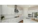 Bright kitchen featuring white cabinetry, stainless steel appliances, and ample counter space at 4611 E Casitas Del Rio Dr, Phoenix, AZ 85050