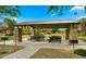 Community picnic area with covered tables and BBQ grills, ideal for outdoor gatherings at 4611 E Casitas Del Rio Dr, Phoenix, AZ 85050