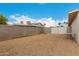 The expansive back yard features block wall fencing and desert landscaping at 4739 W Paradise Ln, Glendale, AZ 85306