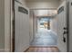 Bright entryway with hardwood floors leading into a spacious, light-filled living area at 4739 W Paradise Ln, Glendale, AZ 85306