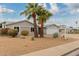 Charming single-story home featuring desert landscaping and a two-car garage at 4739 W Paradise Ln, Glendale, AZ 85306