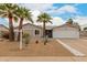 Charming single-story home featuring desert landscaping and a two-car garage at 4739 W Paradise Ln, Glendale, AZ 85306