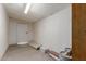 Spacious storage room features a door and paint cans ready for your project at 4739 W Paradise Ln, Glendale, AZ 85306