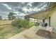 Inviting covered patio with furniture and a well-maintained yard at 6461 E Jensen St, Mesa, AZ 85205
