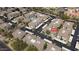 Aerial view of complex showing multiple units, covered parking, and pool at 6900 E Princess Dr # 2124, Phoenix, AZ 85054