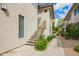 Exterior of a home with an outside staircase at 6900 E Princess Dr # 2124, Phoenix, AZ 85054