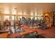 Community gym featuring weight lifting machines and treadmills at 6900 E Princess Dr # 2124, Phoenix, AZ 85054