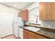 Bright kitchen showcasing stainless appliances, modern cabinets, and granite countertops at 6900 E Princess Dr # 2124, Phoenix, AZ 85054