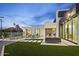 Beautiful backyard oasis featuring a modern pool, lush green turf, and stylish outdoor seating area at 7009 E Pasadena Ave, Paradise Valley, AZ 85253