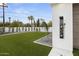 Lush backyard featuring a modern outdoor shower at 7009 E Pasadena Ave, Paradise Valley, AZ 85253