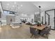 Expansive open-concept space with kitchen, dining, and living areas featuring modern design and abundant light at 7009 E Pasadena Ave, Paradise Valley, AZ 85253