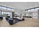 Open-concept living space boasts high ceilings, large windows, and seamless transition to outdoor area at 7009 E Pasadena Ave, Paradise Valley, AZ 85253