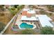 Aerial view of private home with pool, patios, and desert landscaping at 706 N Signal Butte Rd, Mesa, AZ 85207