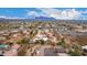 Desert community aerial view featuring mountain views and scattered custom homes at 706 N Signal Butte Rd, Mesa, AZ 85207