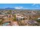 Desert community aerial view featuring mountain views and scattered custom homes at 706 N Signal Butte Rd, Mesa, AZ 85207