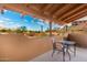 Exterior balcony with desert vista and outdoor seating at 706 N Signal Butte Rd, Mesa, AZ 85207