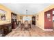 Elegant dining room featuring a formal table set and classic furnishings at 706 N Signal Butte Rd, Mesa, AZ 85207