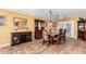 Charming dining room with elegant furniture, stylish decor, and ample lighting at 706 N Signal Butte Rd, Mesa, AZ 85207