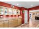Kitchen with wood cabinets, granite countertops, and pantry/storage space at 706 N Signal Butte Rd, Mesa, AZ 85207