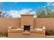 Custom BBQ area in backyard, perfect for outdoor entertaining and relaxation at 706 N Signal Butte Rd, Mesa, AZ 85207