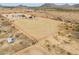 Fenced horse property showing the boundaries, buildings and open space for equestrian activities at 7209 N Maple St, Maricopa, AZ 85139