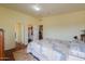 Cozy bedroom with closet, neutral walls, and comfortable queen bed at 7209 N Maple St, Maricopa, AZ 85139