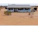Charming block home with desert landscaping and covered porch at 7209 N Maple St, Maricopa, AZ 85139