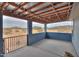 Covered patio with partial walls and decorative metal fence, views of the desert landscape at 7209 N Maple St, Maricopa, AZ 85139