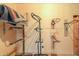Tack room interior view with various pieces of horse tack on the walls at 7209 N Maple St, Maricopa, AZ 85139