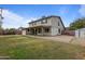 Expansive backyard with grass and a brick patio, perfect for outdoor living at 843 W Nido Ave, Mesa, AZ 85210